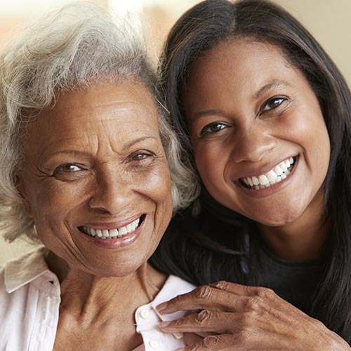 mother daughter smiling