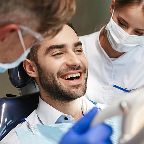 smiling man at the dentist